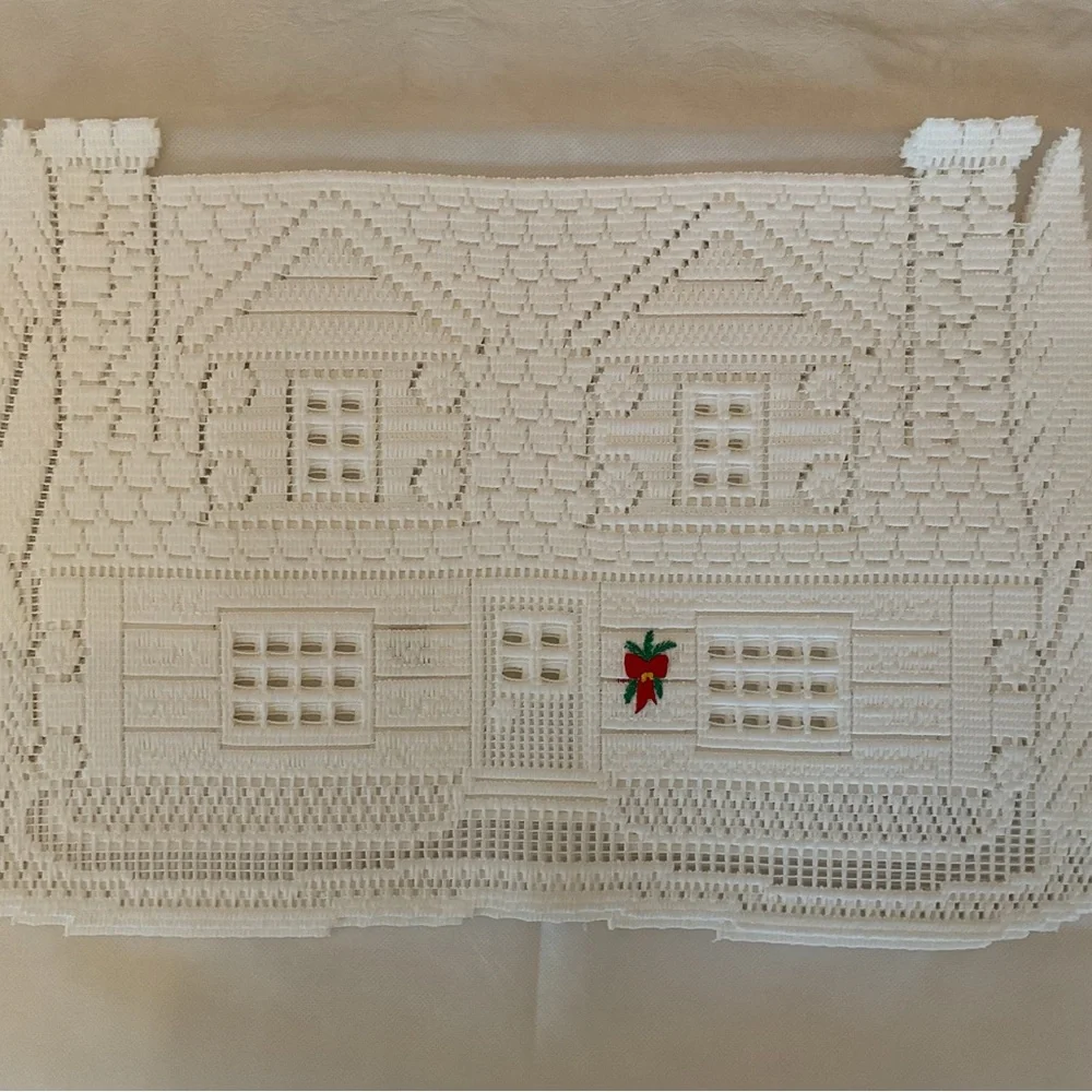 White Holiday House Lace placemats and runner.